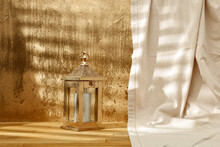 Gold Wall And Artwork With Blank Space And Shadows In The Background 