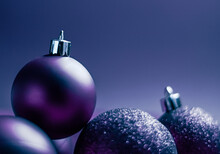 Purple Christmas Baubles As Festive Winter Holiday Background.