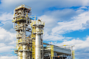 View of the absorption distillation column of gas liquefaction in summer.