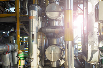 Wall Mural -  metal structure made of pipes at a liquefied gas production plant.