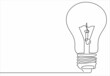 © nikvector - continuous line drawing of light bulb or idea