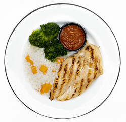 Sticker - Top shot of a decorative white plate with boiled rice, broccoli, and grilled chicken