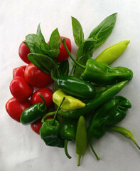 Sticker - Fresh green peppers and tomatoes on white background