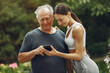 © prostooleh - Portrait of happy handsome older man using smartphone