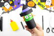 © nadezhda - Craft with a child for Halloween from rolls of toilet paper and colored paper witch. Step-by-step instruction. Step 2.