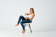 © SHOTPRIME STUDIO - woman sitting on chair with laptop communication isolated background