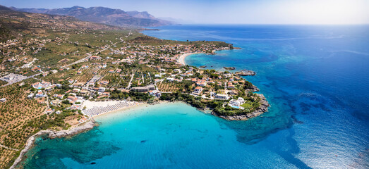 Panoramic aerial view of the beaches of Kalogria and Stoupa, Messenia, Greece, with turquoise shining sea during summer time