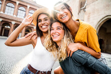 Three Young Diverse Women Having Fun On City Street Outdoors - Multicultural Female Friends Enjoying A Holiday Day Out Together - Happy Lifestyle, Youth And Young Females Concept