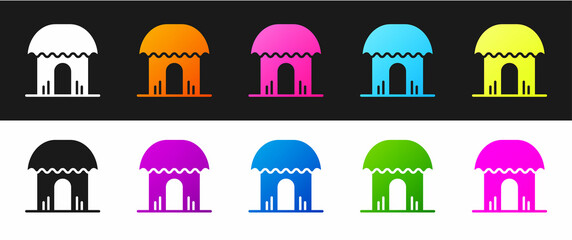 Sticker - Set African hut icon isolated on black and white background. African house symbol. Vector