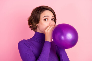 Poster - Photo of nice brunette millennial lady blow balloon wear violet turtleneck isolated on pink background