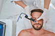 Spa client being treated for blackheads on his nose