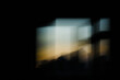 © LenaDano - abstract sunset window in the dark room