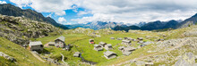 Stone Huts And Rifugio Cristina Surrounded By Rhaetian Alps, Alpe Prabello, Valmalenco, Valtellina, Lombardy