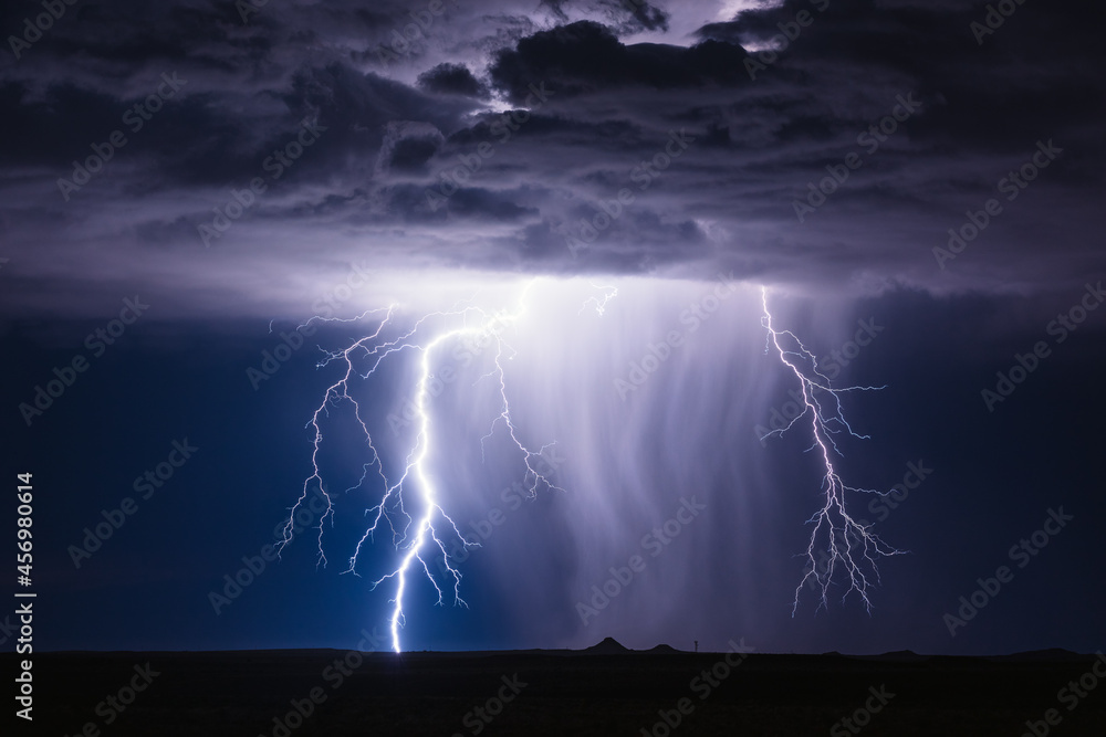 Lightning bolt strike in a storm. Thunderstorm with dramatic clouds in ...