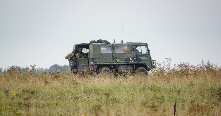 Wall Mural - A British army Steyr-Daimler-Puch - BAE Systems Pinzgauer high-mobility 4x4 AWD all-terrain utility vehicle on military exercise Wilts UK