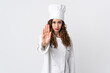 © luismolinero - Young chef woman isolated on white background making stop gesture