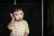 © TimmyTimTim - Asian Boy toddler playing to make a phone call with smartphone in his hand. Child play and acting. Communication technology concept.