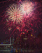 Festive New Year's Eve Celebration: Illuminated Sky with Explosive Fireworks Display