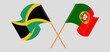 Crossed and waving flags of Jamaica and Portugal