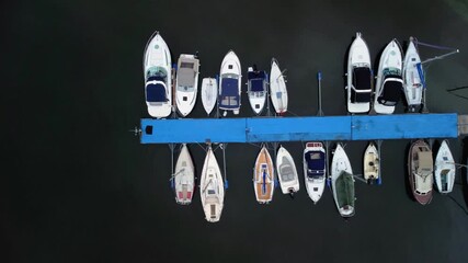 Poster - A beautiful view of fishing boats in a mossy lake