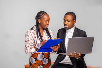 handsome manager and his co worker working on their business plan