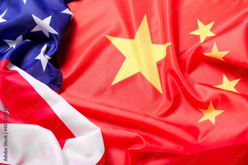 Flags of China and USA as background
