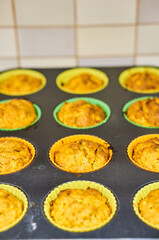 Poster - Freshly baked carrot cupcakes in a muffin tins