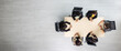 © Bangkok Click Studio - Top view of meeting conference wooden table with six executives businesswomen sitting on each chairs discussing and talking business in team work in meeting room
