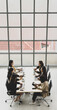 © Bangkok Click Studio - High view of six executives businesswomen sitting on each chairs using laptops and tablets on wooden conference table in meeting room in office. Concept for business meeting