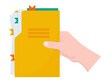 Hand holds a yellow folder with documents. 