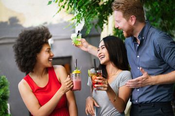 Poster - Group of friends having fun together. People talking laughing and enjoying their time