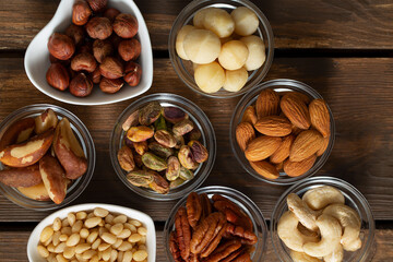 Wall Mural - assortments of nuts on wooden surface