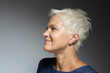 © fStop - Profile portrait beautiful mature woman with short white hair
