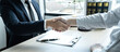 Handshake after consultation between a male lawyer and client, giving advice and prosecutions about the regarding estate