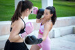 © luisrojasstock - Young caucasian women practicing boxing in a park