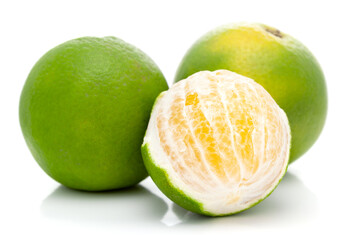 Close-up of Organic Indian Citrus fruit sweet limetta or mosambi (Citrus limetta) peeled by hand , it is an green and yellow in color, isolated over white background,