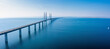 © Aerial Film Studio - Panoramic aerial view of the Oresundsbron bridge between Denmark and Sweden. Oresund Bridge view at sunset.