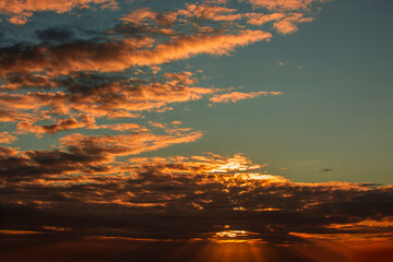 Wall Mural - dramatic cloudy sky at sunset.