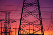 Transmission line, natural energy. electric pillars on sunset. high voltage post.High-voltage tower sky background.