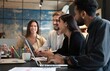 © opolja - Group of young multiracial people working in modern office. Businessmen at work during meeting.