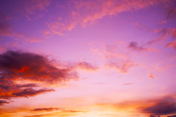 Wall Mural - colorful sunset. purple red orange yellow sky with clouds. beautiful evening sky background.