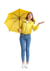 Wall Mural - Displeased young woman with umbrella on grey background