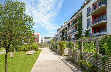 Wall Mural - Modern apartment buildings in a green residential area in the city