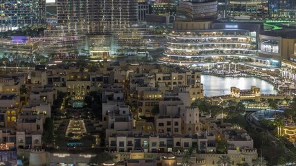 Sticker - Aerial view to traditional houses of old town island night timelapse from above.