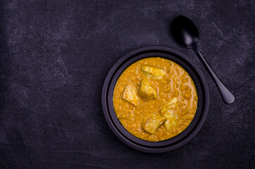 Wall Mural - Curry with vegetables, lentils and meat