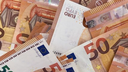 Wall Mural - 4k 50 euro bills background. A lot of 50 euro banknotes in motion.