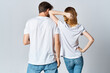 © SHOTPRIME STUDIO - man and woman in white t-shirts and jeans design casual clothing mockup