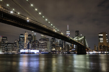 Wall Mural - Brooklyn bridge as seen from the brooklyn waterfront at night