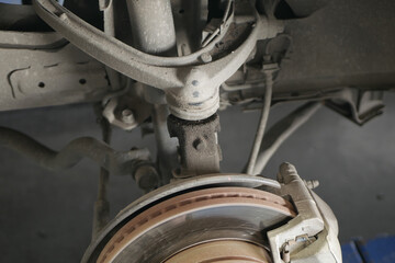 Poster - High angle shot of the dissembled vehicle wheel details with brake disk