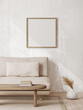 Square wooden frame mockup in warm neutral wabi-sabi interior with low sofa and dried grass in vase on concrete wall background. 3d rendering, illustration.